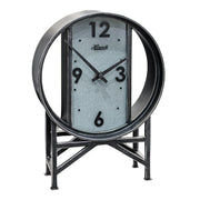 Vintage style metal clock with framework legs and large numbers on white background.