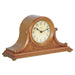 Light oak wood Tambour style mantel clock with ornate design and Hermle logo on face. 