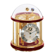 Brass plated Tellurium with sun and earth gears visible under glass dome and Red highlight rings circle the top and bottom.