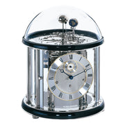 Black and silver Tellurium clock with glass dome and nickel plated mechanical gears visible on white background.