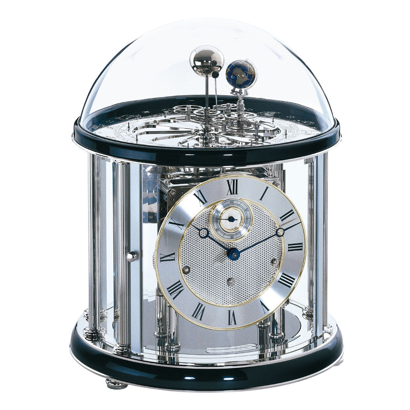 Black and silver Tellurium clock with glass dome and nickel plated mechanical gears visible on white background.