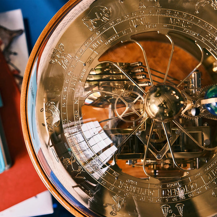 Top down view of brass Tellurium gears and month dial 