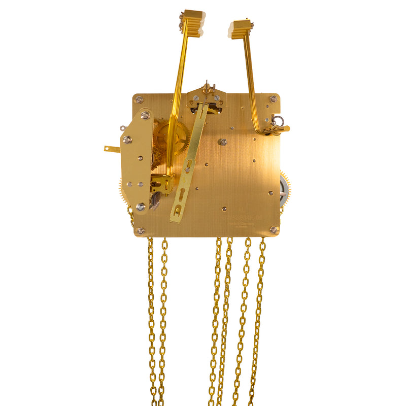 Brass UW32334 clock movement back with visible gears, hammers and hanging chains on white background.