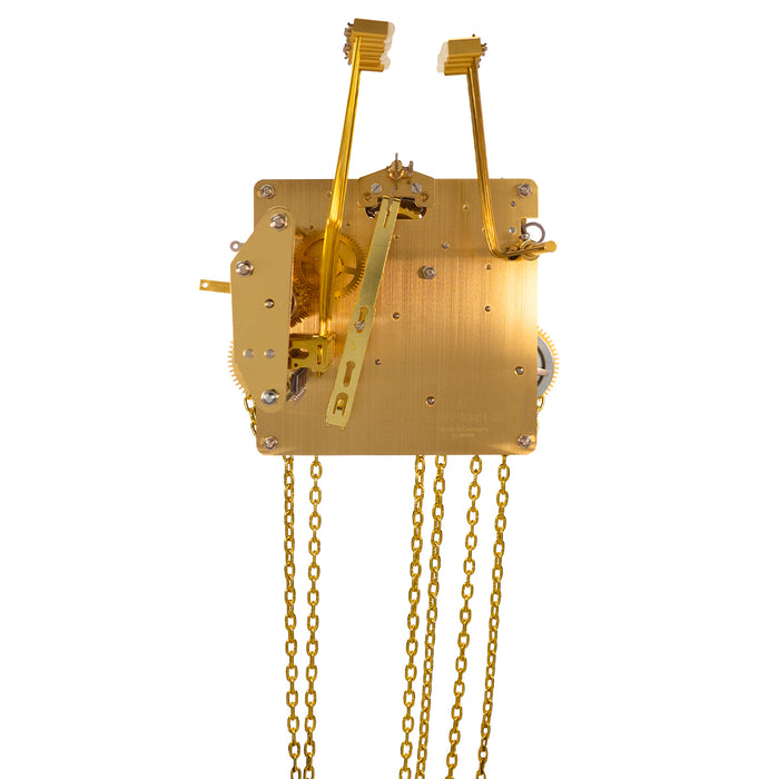 Brass UW32334 clock movement back with visible gears, hammers and hanging chains on white background.