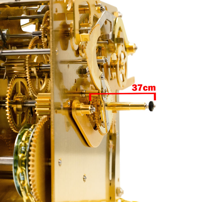 Close-up of a gold clock movement with a measurement label indicating 37cm.