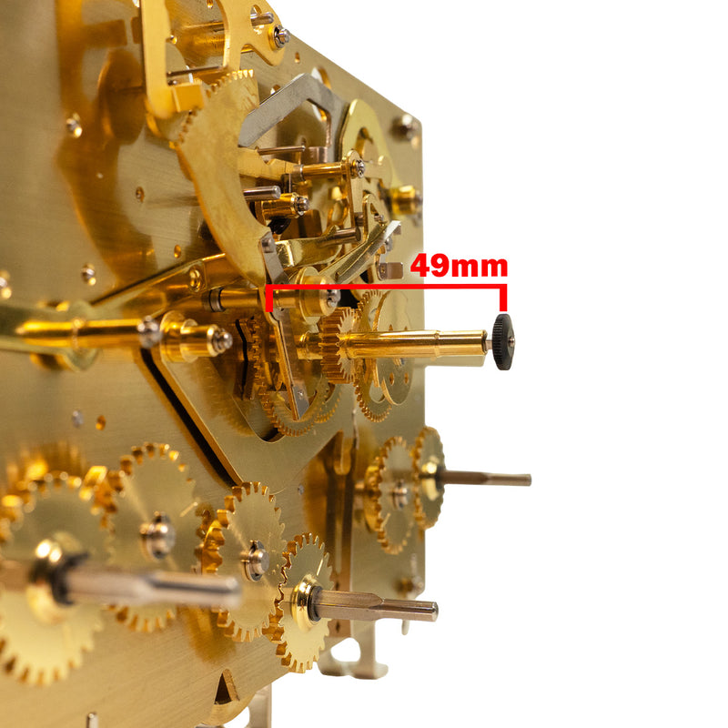 Close-up of a gold clock movement with a measurement label indicating 49mm.