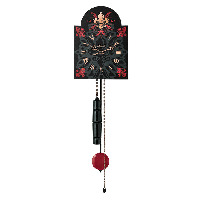 Black Wall clock with decorative red designs and red pendulum on white background.