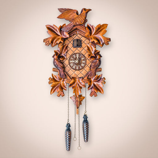 Cuckoo clock hanging on white wall in living room