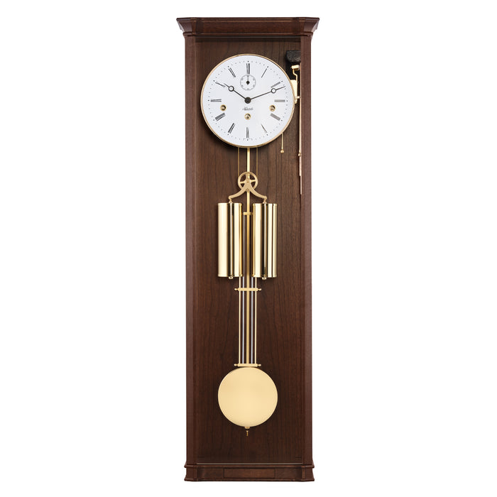 Walnut wood regulator wall clock with brass highlights on white background