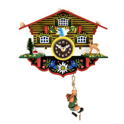 Decorative cuckoo clock with a house design, bird, deer, and a boy climbing a rope