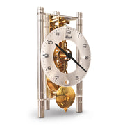 Minimalist Lakin clock kit with visible gears on a white background