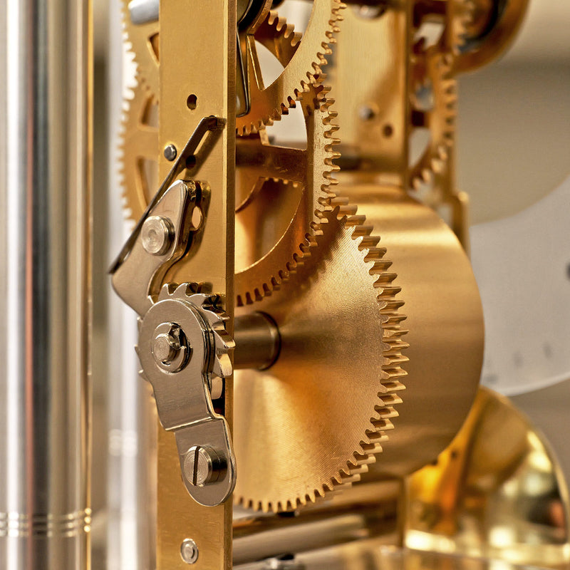 Close-up of DIY Lakin clock kit brass clock mechanism with gears. 